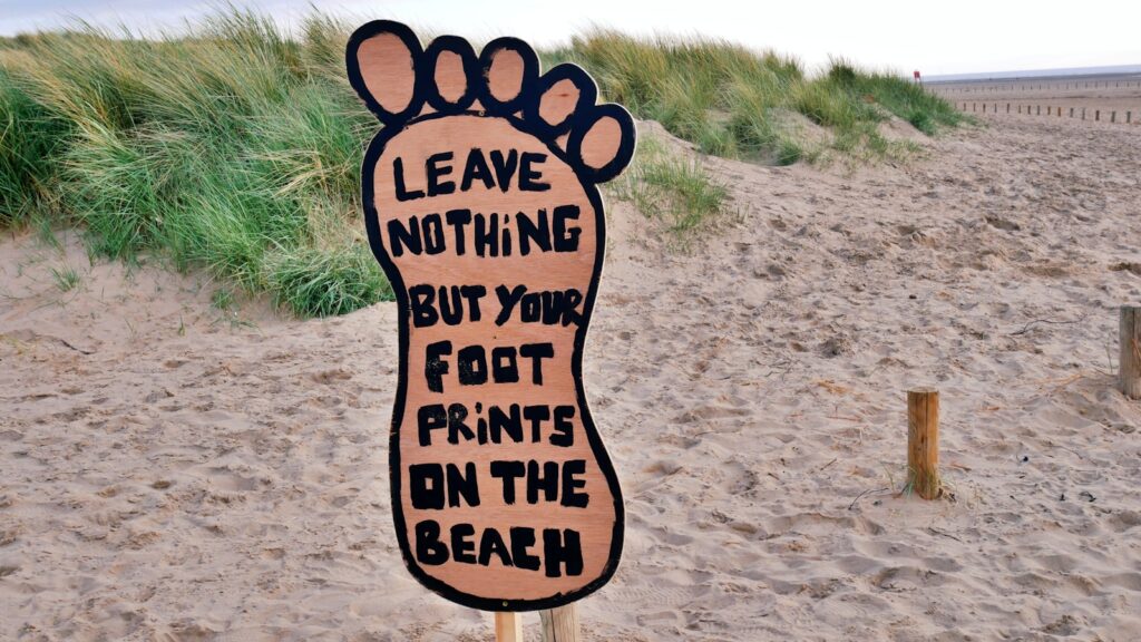 environmental sign on a beach